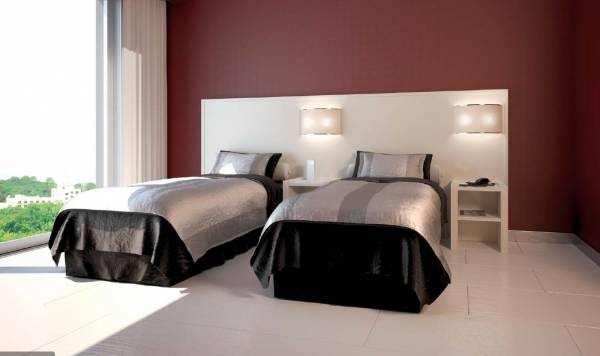 Camera da letto per albergo con letti singoli